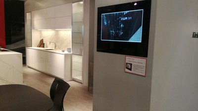 AVEL cabinet door TV at the SieMatic showroom in Paris