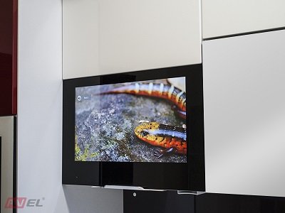 AVEL cabinet door TV in a white kitchen