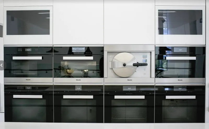 Row of AVEL kitchen TVs above ovens in Australia