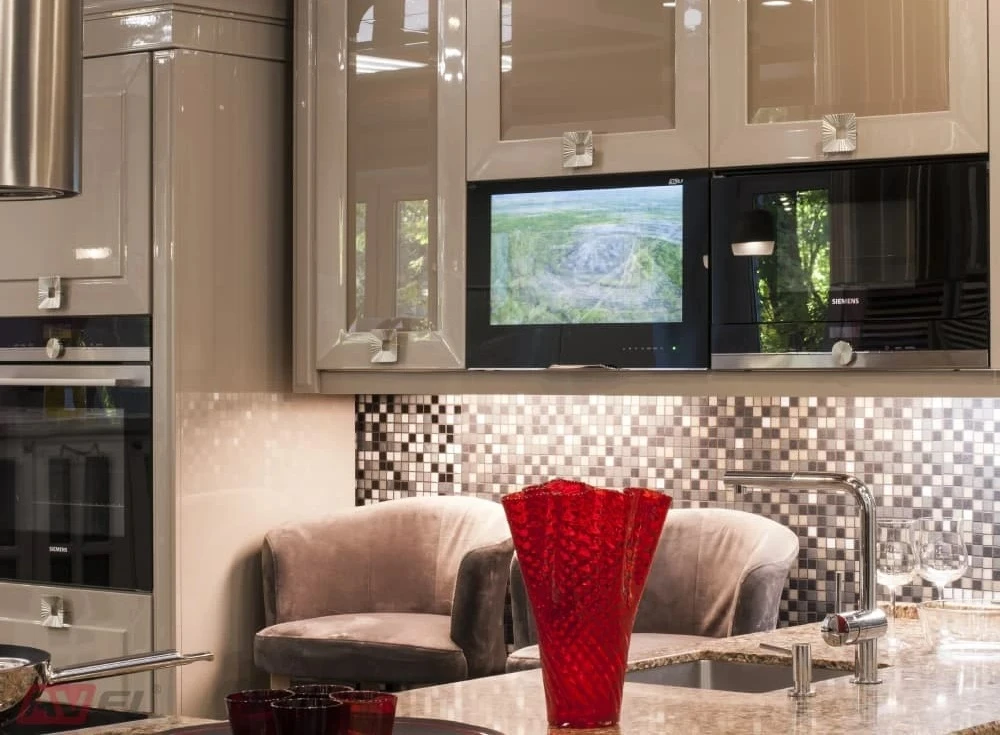 AVEL TV built into kitchen cabinets