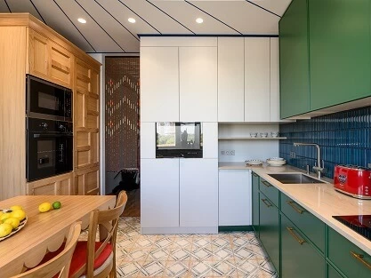 AVEL TV in a white kitchen cabinet column