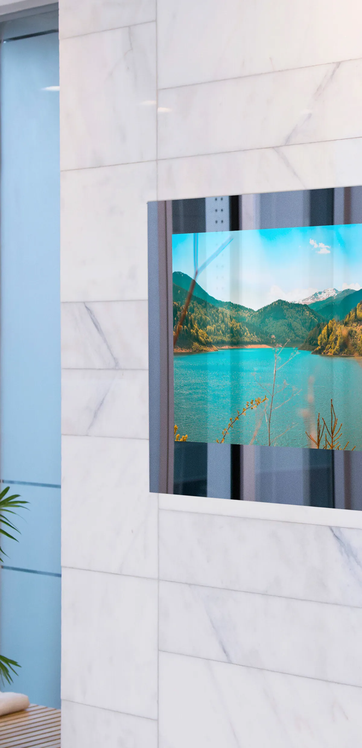 AVEL waterproof TV with a bright picture in a marble bathroom wall