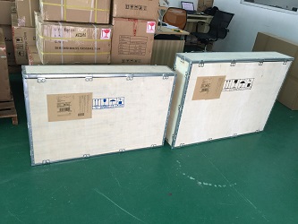 AVEL TVs packed in wooden crates for shipping