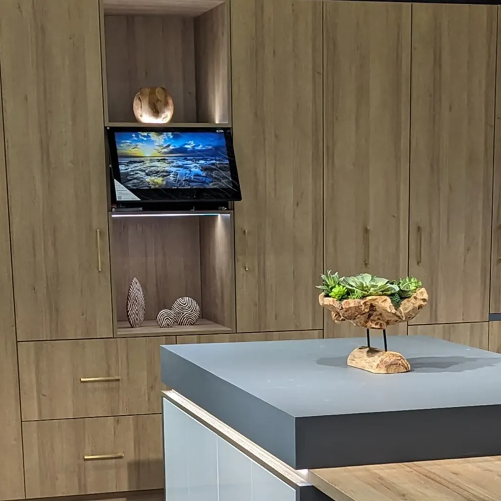 AVEL TV in a wooden kitchen cabinet at KBIS 2024