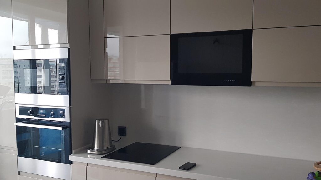AVEL TV in a beige glossy kitchen with the screen off
