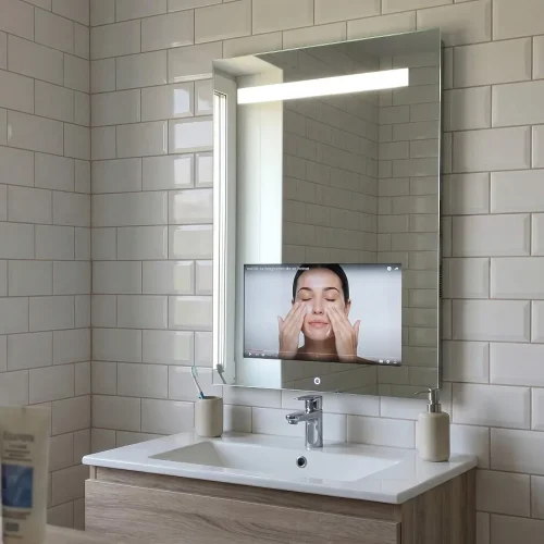AVEL AVS220BT mirror TV above a bathroom sink