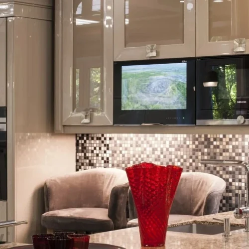 AVEL TV built into kitchen cabinets