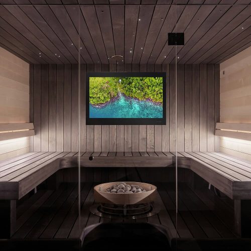 Waterproof TV on the wall of a modern sauna